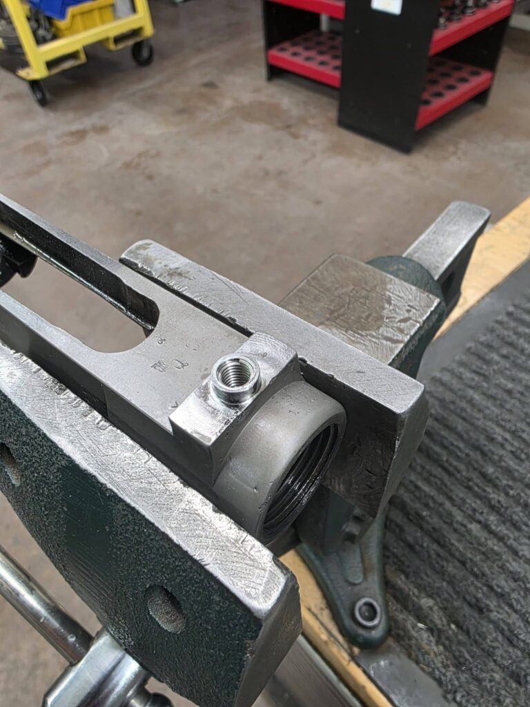 GUNSMITHING SERVICES:  Receiver guard screw restoration/alteration